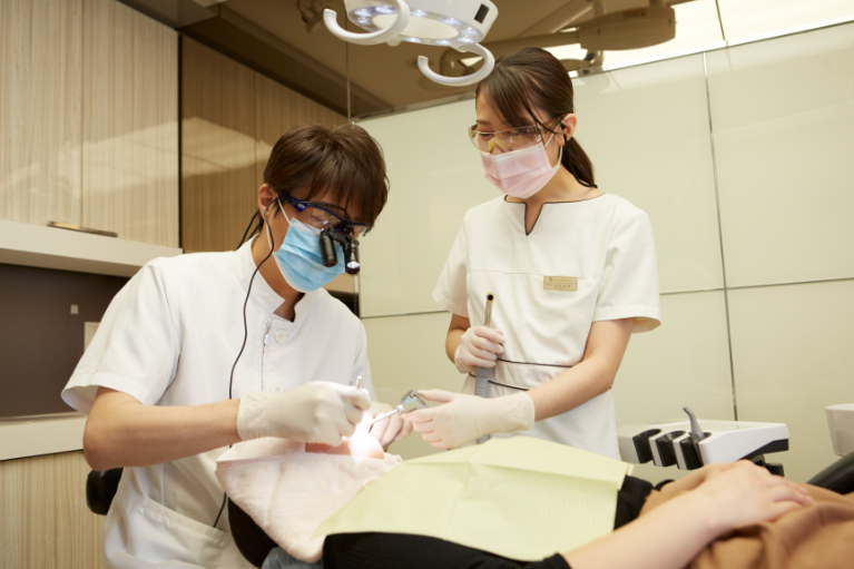 歯周病専門医による予防プログラム